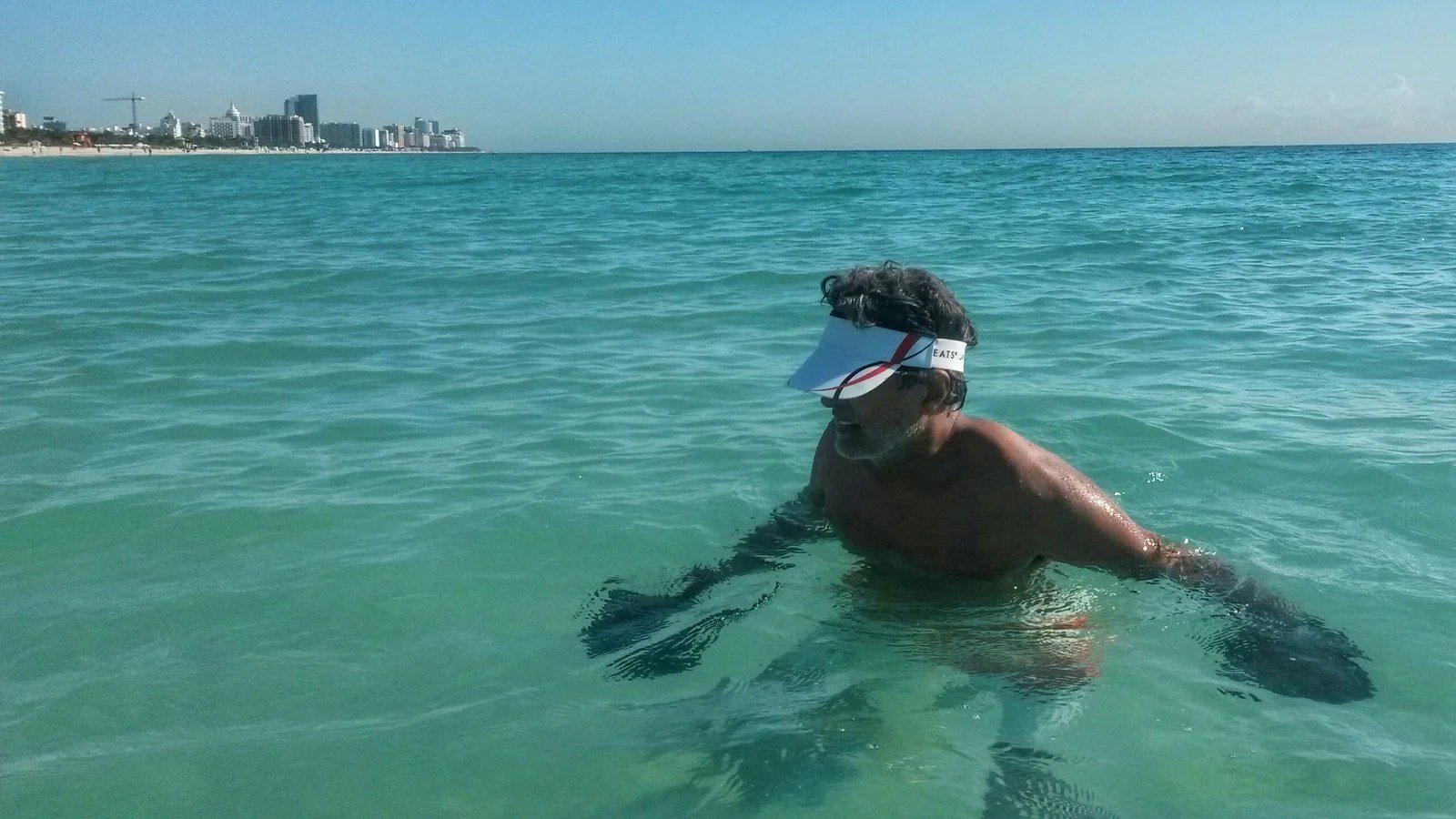 Long-time AquaFit client training in open water