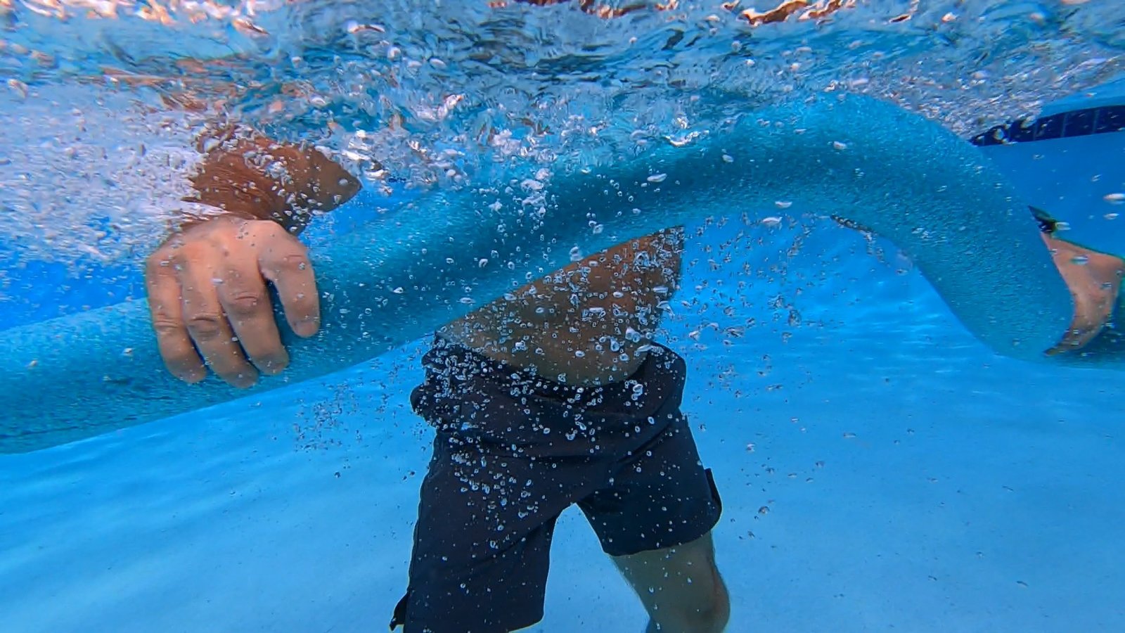 Training in water with a foam noodle